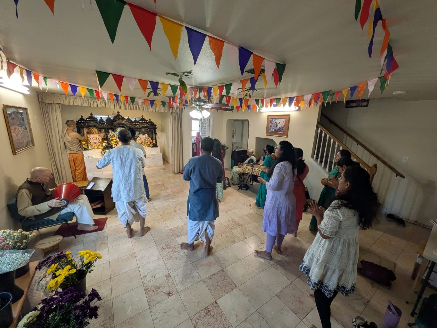 Community temple activity — evening aarti and darshan